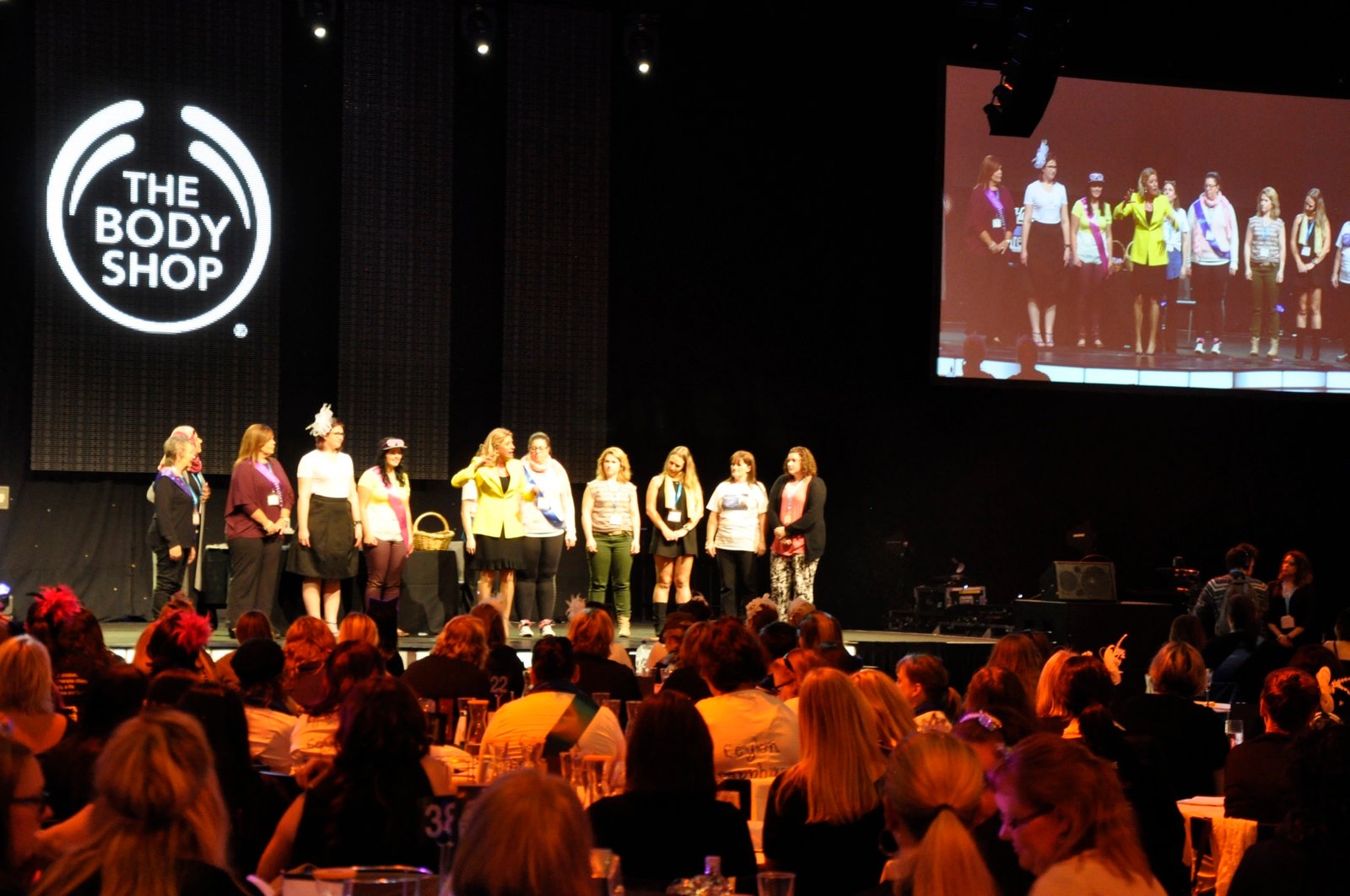 Lisa presenting on The Body Shop stage